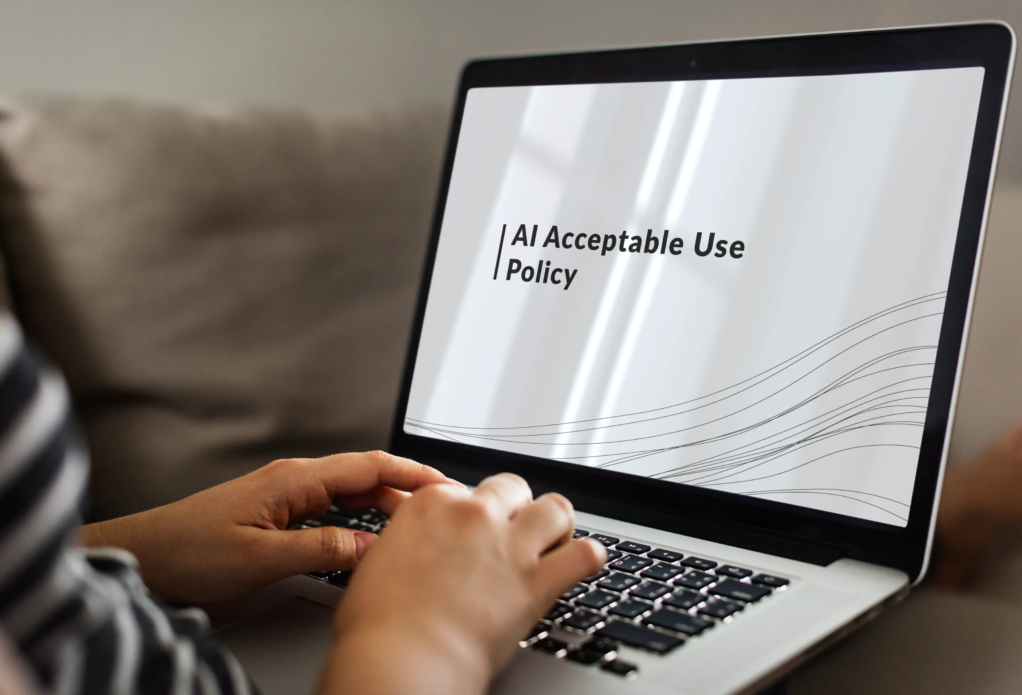 AI AUP text on laptop shown